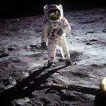 Historic image of an astronaut on the moon during the Apollo mission, showcasing space exploration.